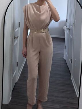 Sperry Sleeveless Beige Draped-Neck Jumpsuit with Chain Belt